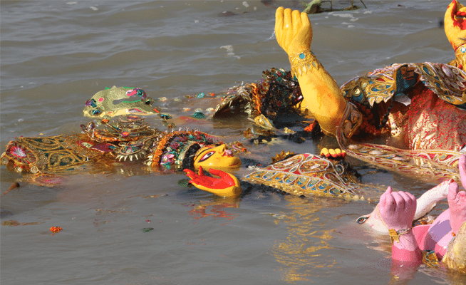 puja-idol-in-river