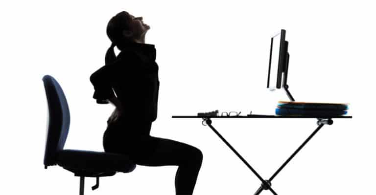 How To Keep Your Spine Healthy While Sitting And Working For Long Hours
